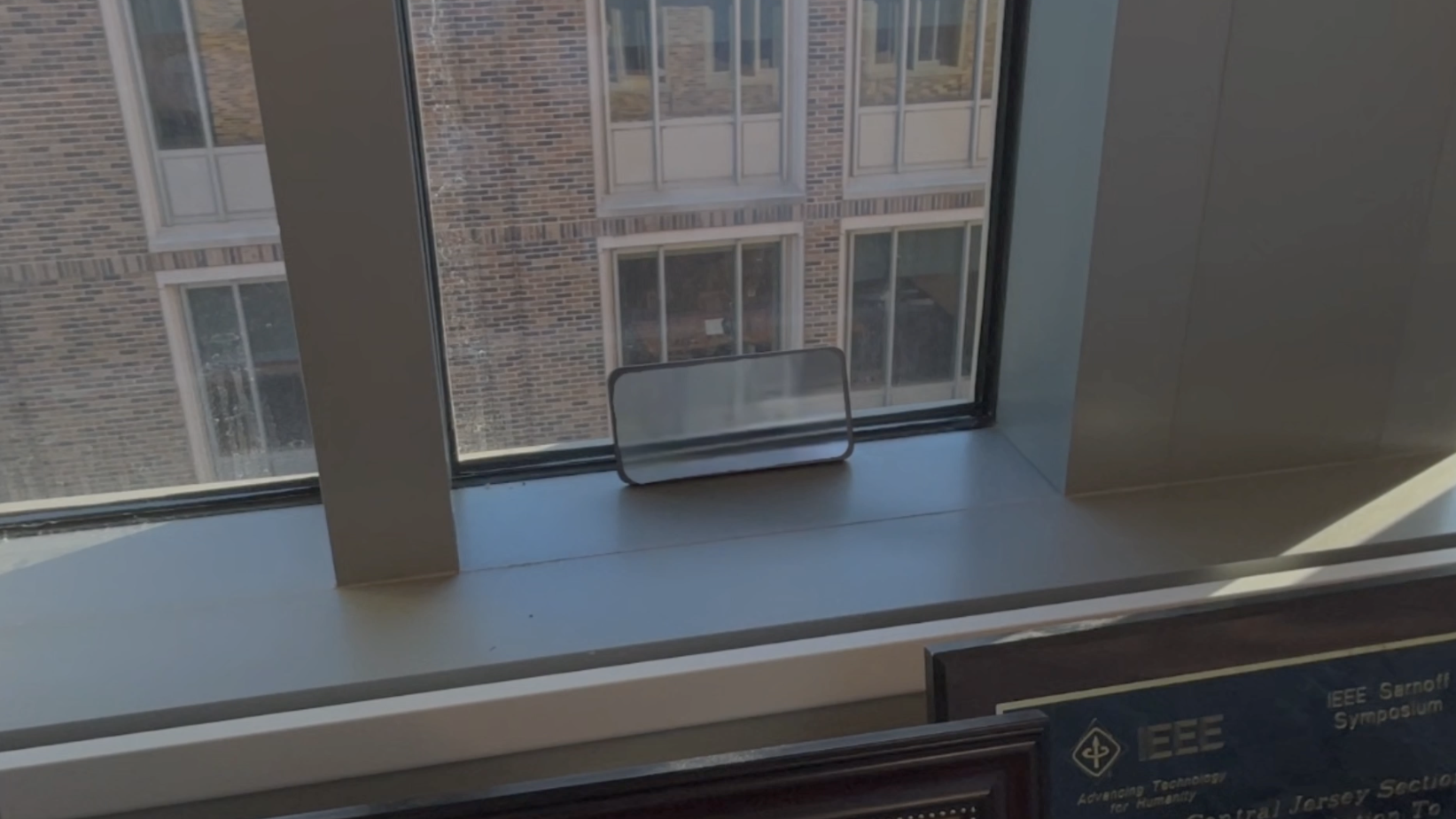 Diminished Phone On Window 2